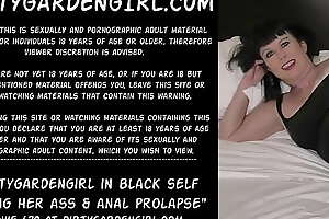 Dirtygardengirl in black self fisting her ass and anal prolapse