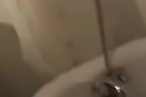 Blonde in the bathtub sucks off a black cock and gets a hugely messy facial