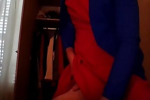Cute secretary crossdresser masturbating in a red dress and blue blazer