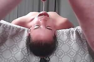 pisswhore drinking piss with her mouth stretched open